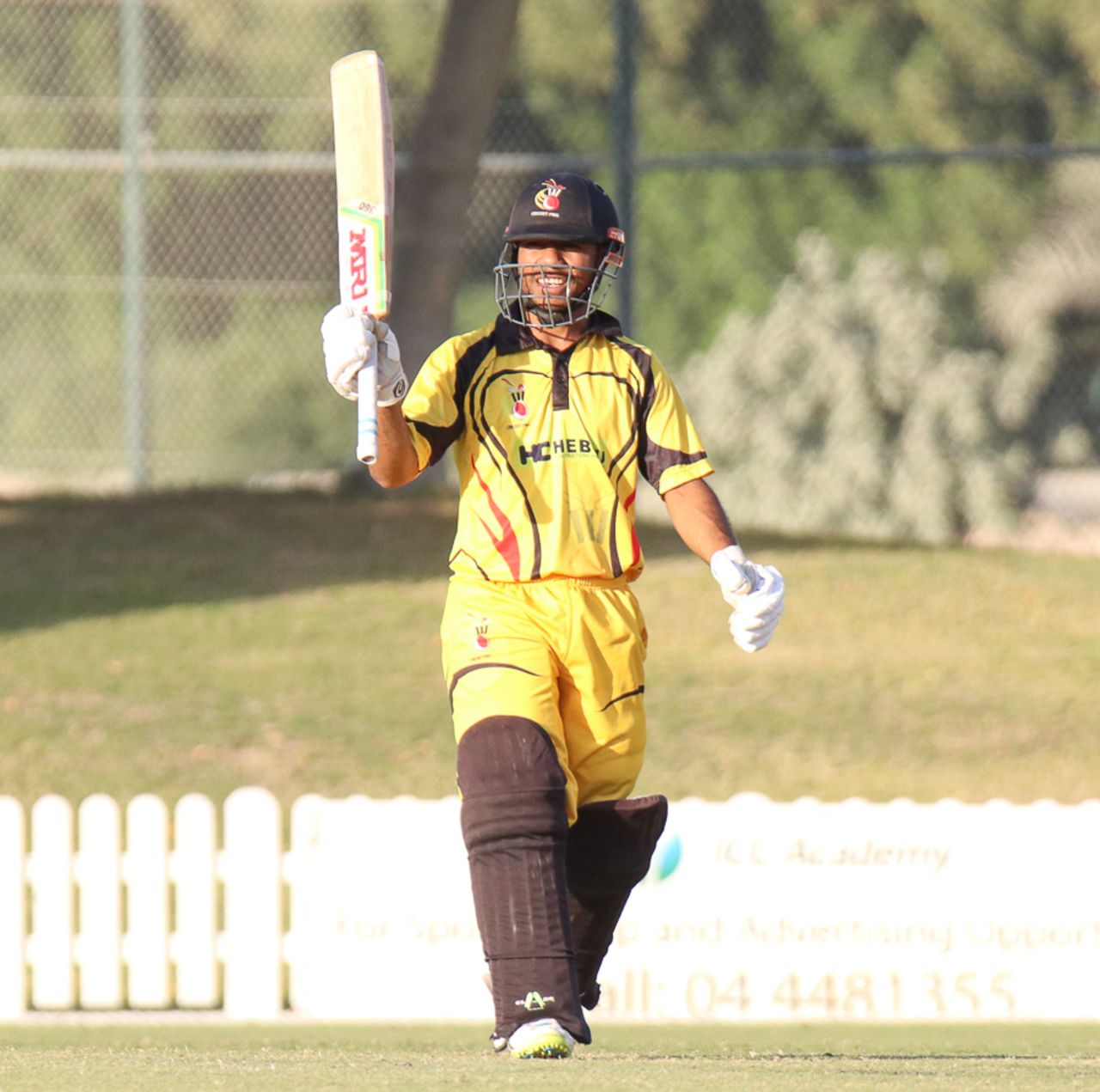 Sese Bau grins and raises his bat after reaching his maiden ODI fifty, Hong Kong v Papua New Guinea, 1st ODI, 2015-17 WCL Championship, Dubai, December 6, 2017