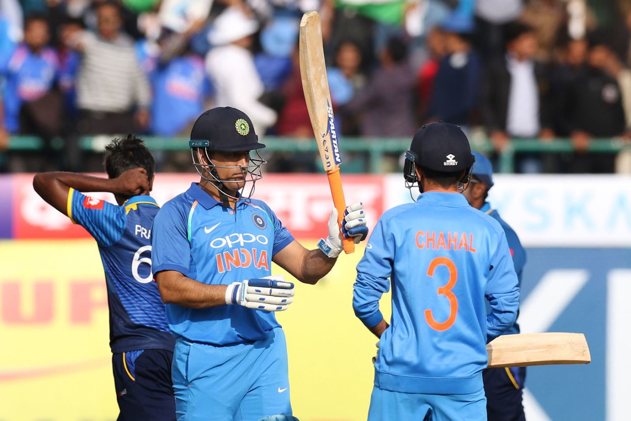 MS Dhoni raises his bat after getting to his half-century, India v Sri Lanka, 1st ODI, Dharamsala, December 10, 2017