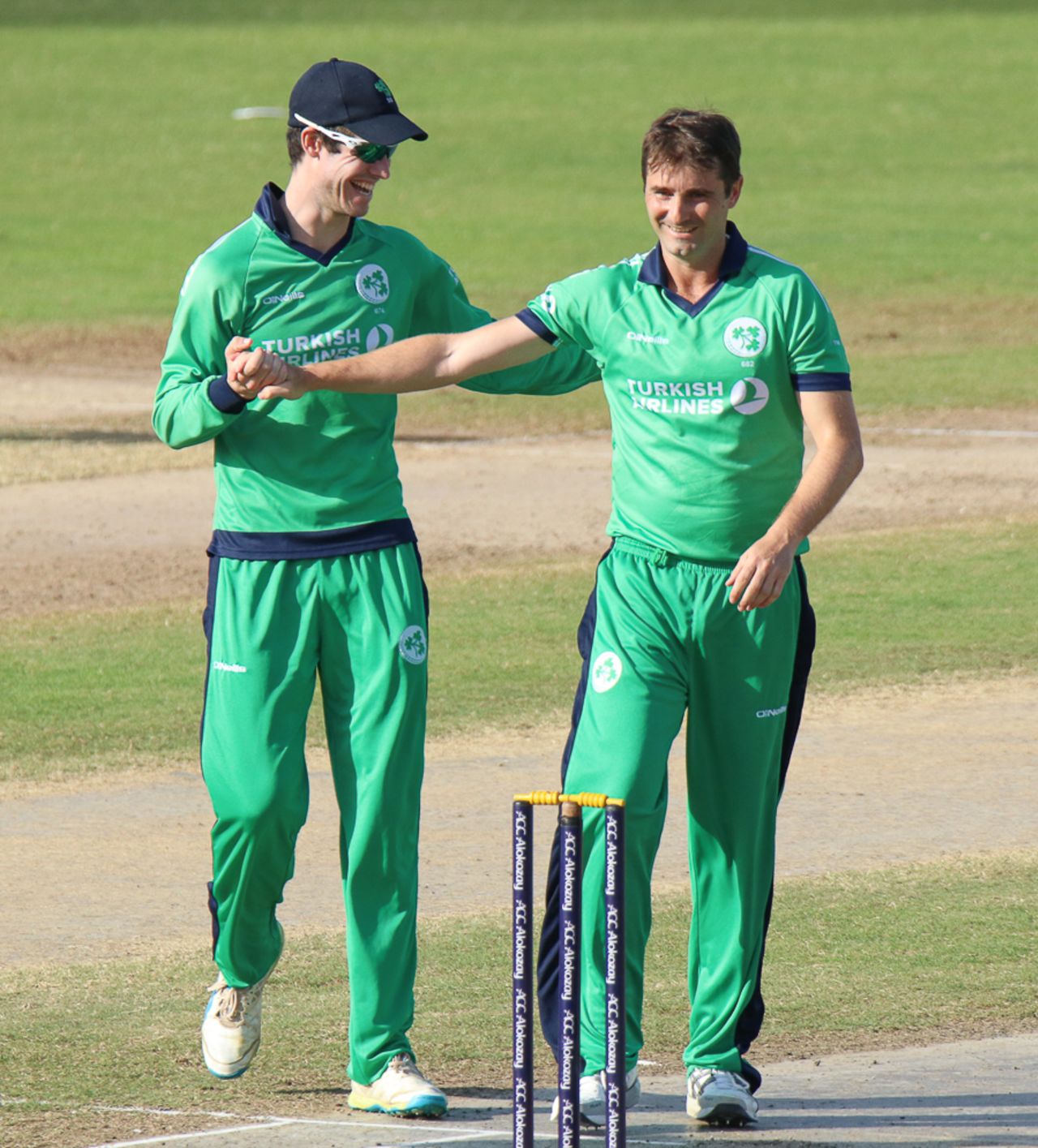 George Dockrell congratulates Tim Murtagh for taking the first wicket, Afghanistan v Ireland, 3rd ODI, Sharjah, December 10, 2017