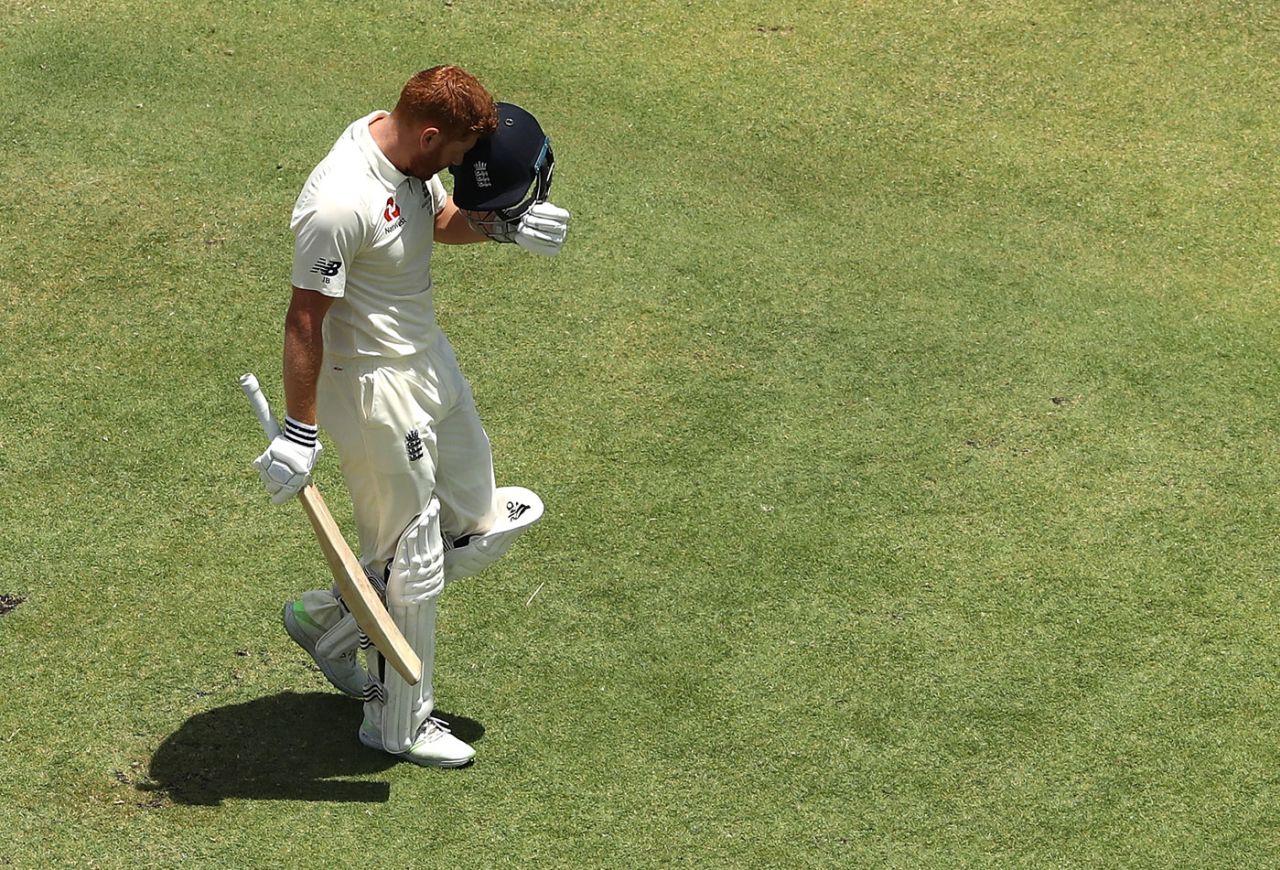 Head-on: Jonny Bairstow marks his century by nuzzling his helmet, Australia v England,  3rd Test, Perth, 2nd day, December 15, 2017