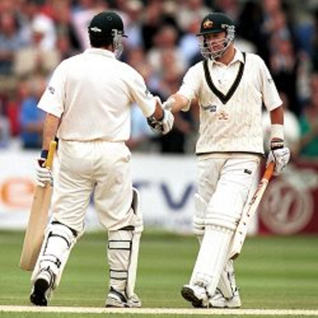 20 Jul 2001: Mark Waugh of Australia is congratulated on his hundred by brother Steve Waugh during the second day of the Second Npower Test between Engalnd and Australia at Lord's, London.