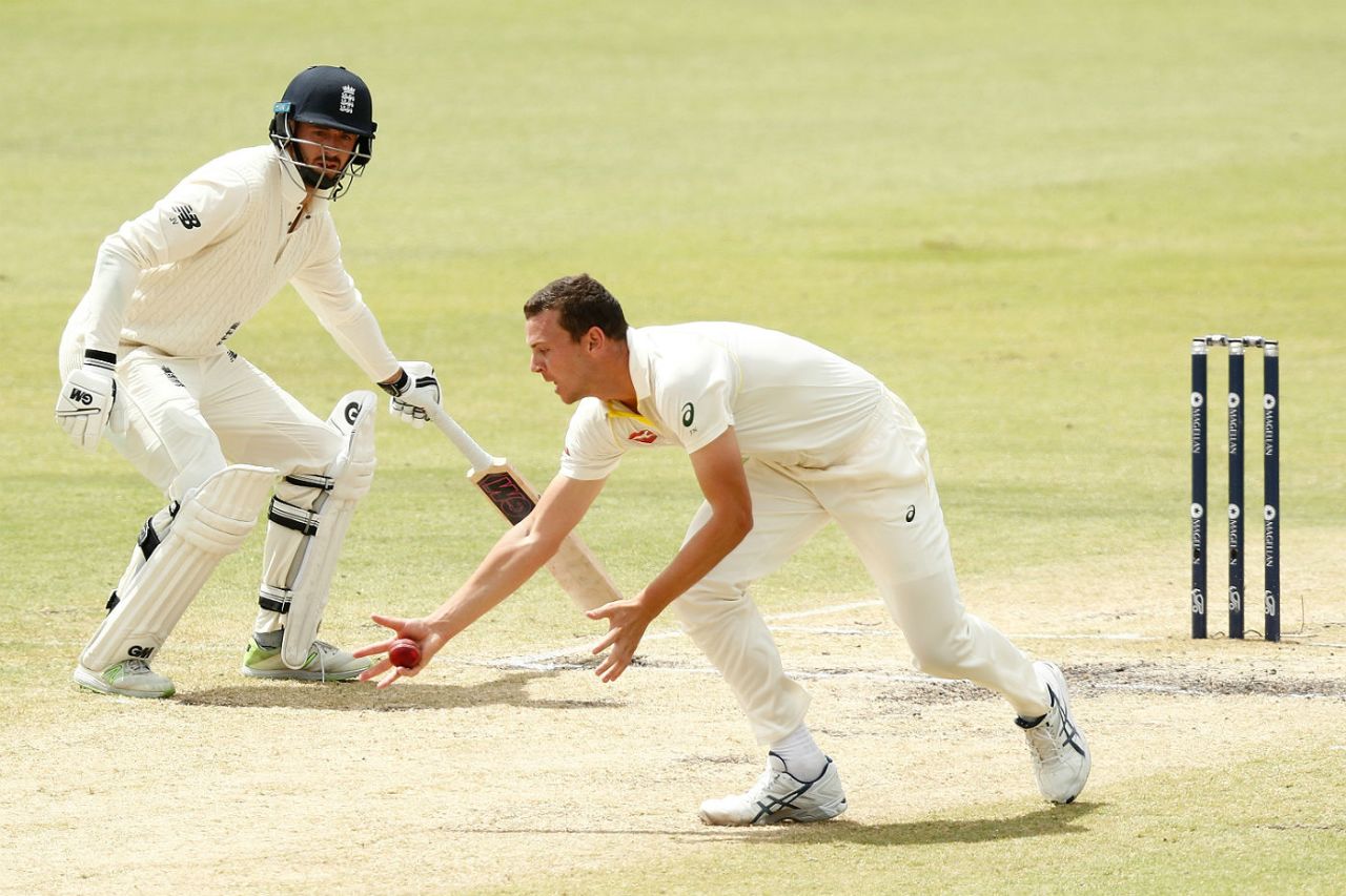 Josh Hazlewood stoops to claim a low catch off Alastair Cook, Australia v England, 3rd Test, Perth, 4th day, December 17, 2017