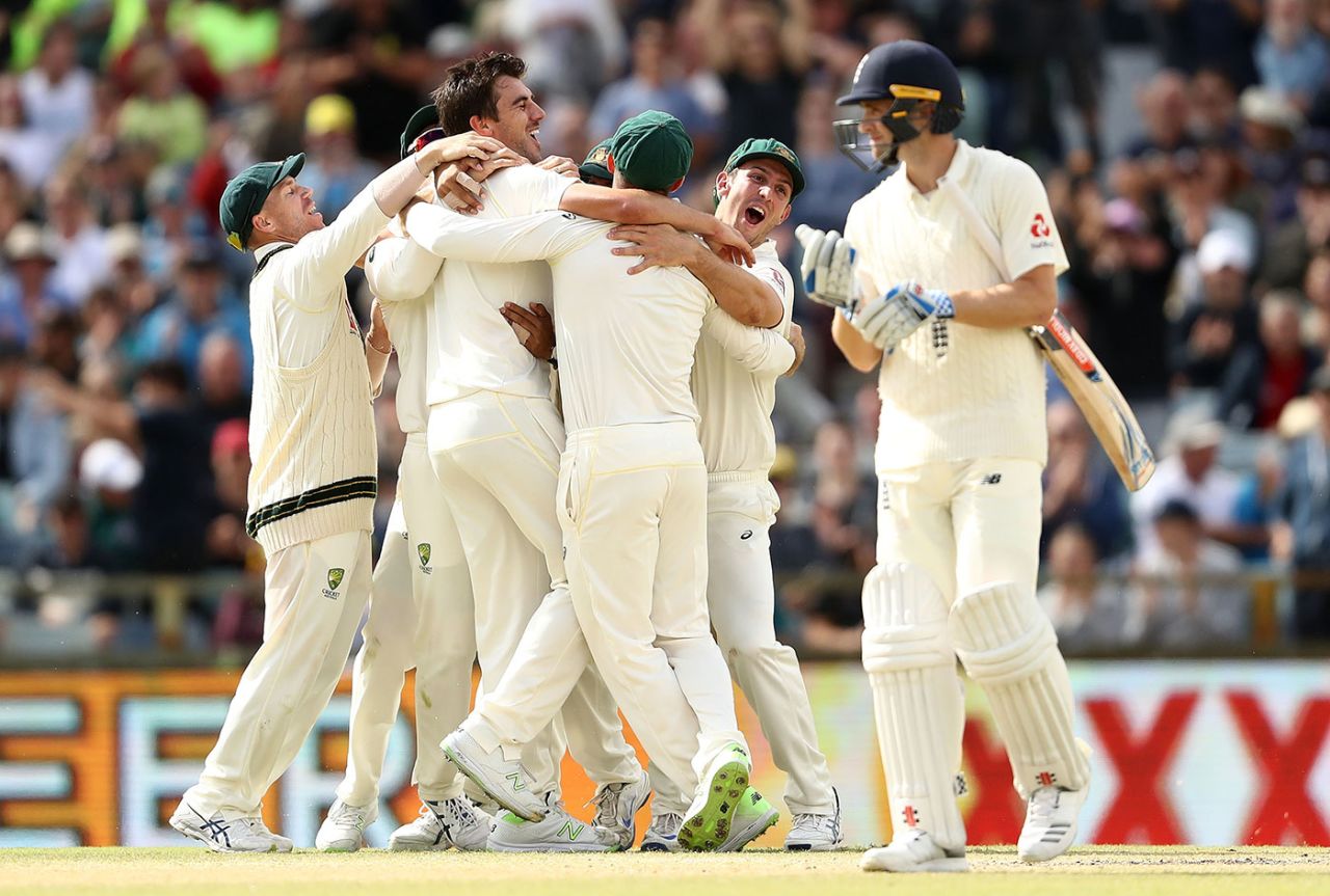 
Winning moment: Australia celebrate as Pat Cummins takes the Ashes-clinching wicket
, Australia v England, 3rd Test, Perth, 5th day, December 18, 2017