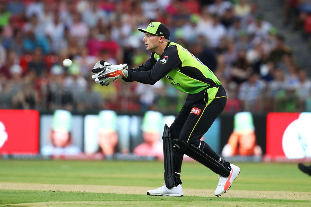 Jos Buttler is a picture of concentration as he receives the ball, Sydney Thunder v Sydney Sixers, Big Bash League 2017-18, Sydney, December 19, 2017