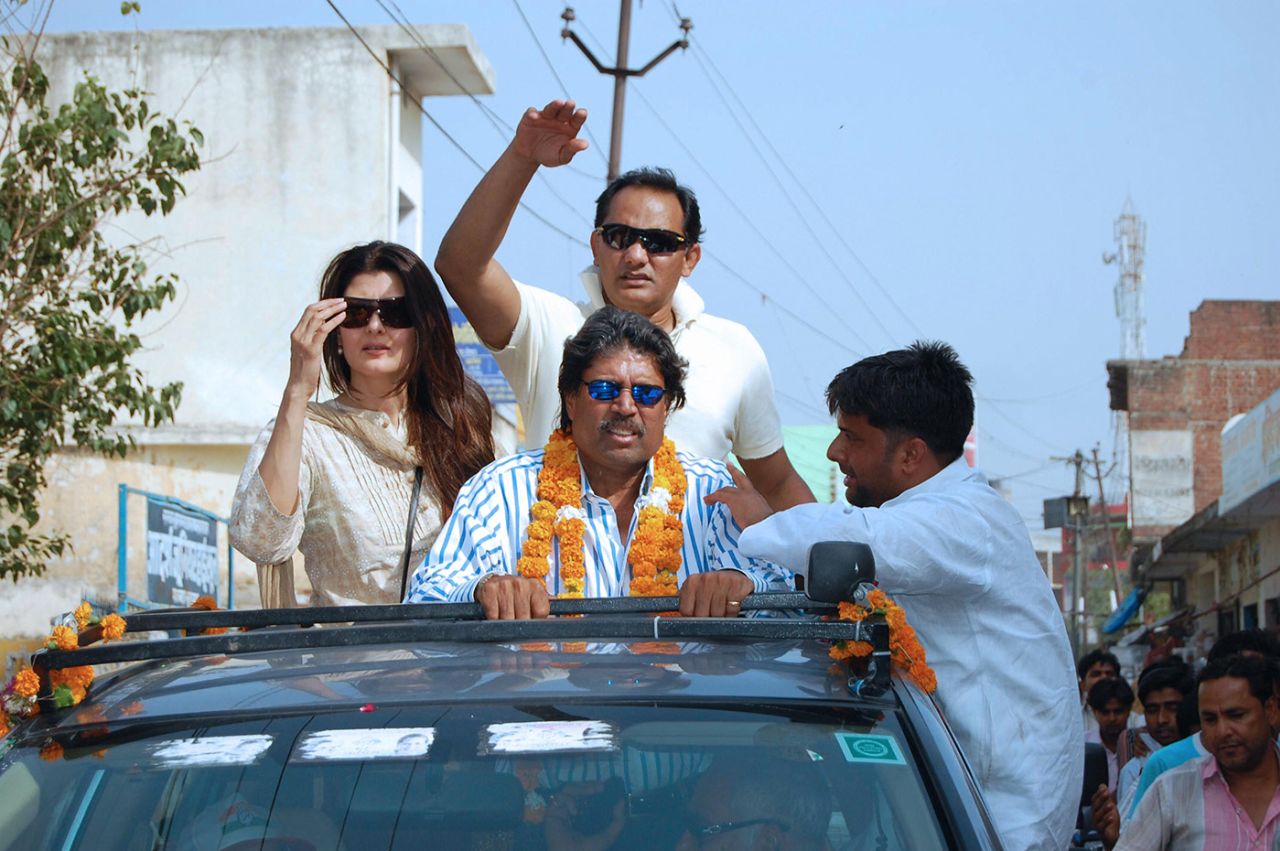 Mohammad Azharuddin (centre, top), his wife, Sangeeta Bijlani, and Kapil Dev campaign ahead of the general election, Moradabad, Uttar Pradesh, May 5, 2009