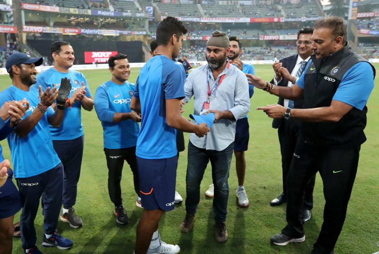 Washington Sundar receives his T20 cap from Sarandeep Singh, India v Sri Lanka, 3rd T20I, Mumbai, December 24, 2017