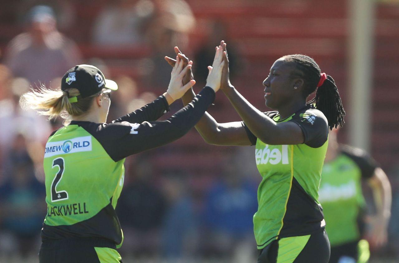 Stafanie Taylor celebrates with Alex Blackwell, Hobart Hurricanes v Sydney Thunder, Women's Big Bash League, Launceston, December 30, 2017