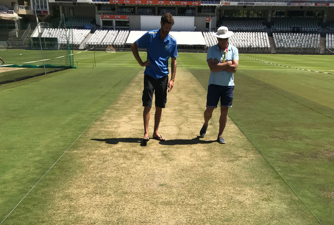 Curator Evan Flint (left) inspects the pitch at Newlands, India v South Africa, Cape Town, January 2, 2018