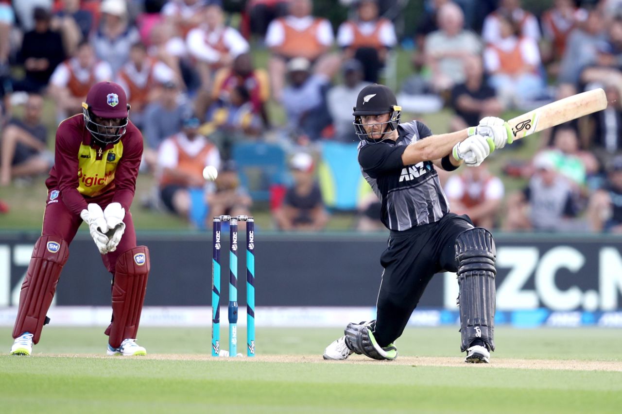 Martin Guptill plays a flat-batted drive, New Zealand v West Indies, 3rd T20I, Mount Maunganui