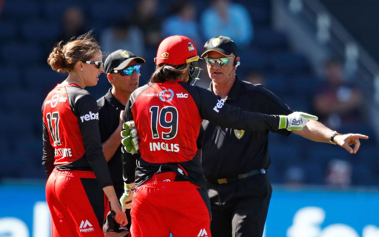 Amy Satterthwaite and Sarah Inglis debate with the umpires, Melbourne Renegades v Sydney Sixers, Women's Big Bash League 2017-18, Victoria, January 3, 2018