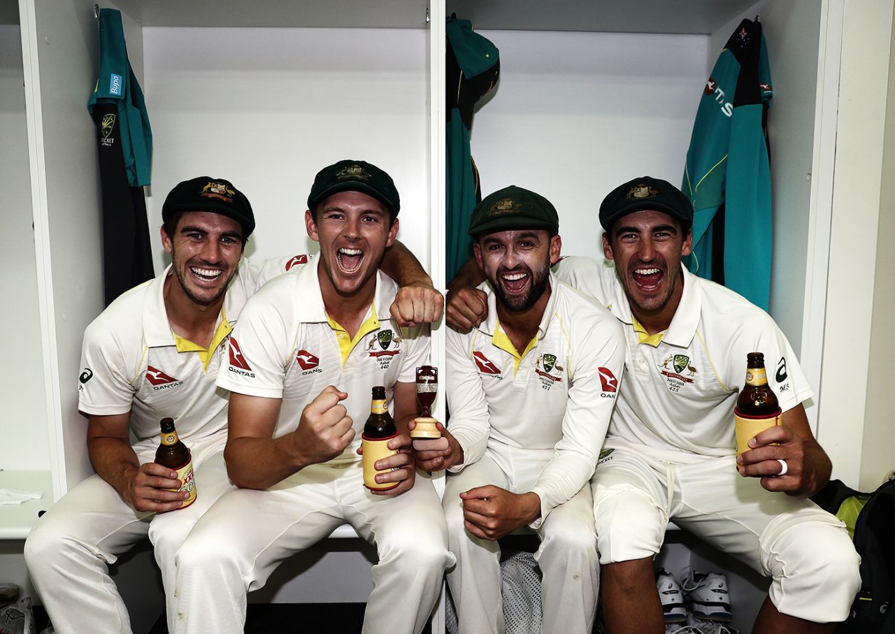 Pat Cummins, Josh Hazlewood, Nathan Lyon and Mitchell Starc celebrate Australia's Ashes win, Australia v England, 3rd Test, Perth, 5th day, December 18, 2017
