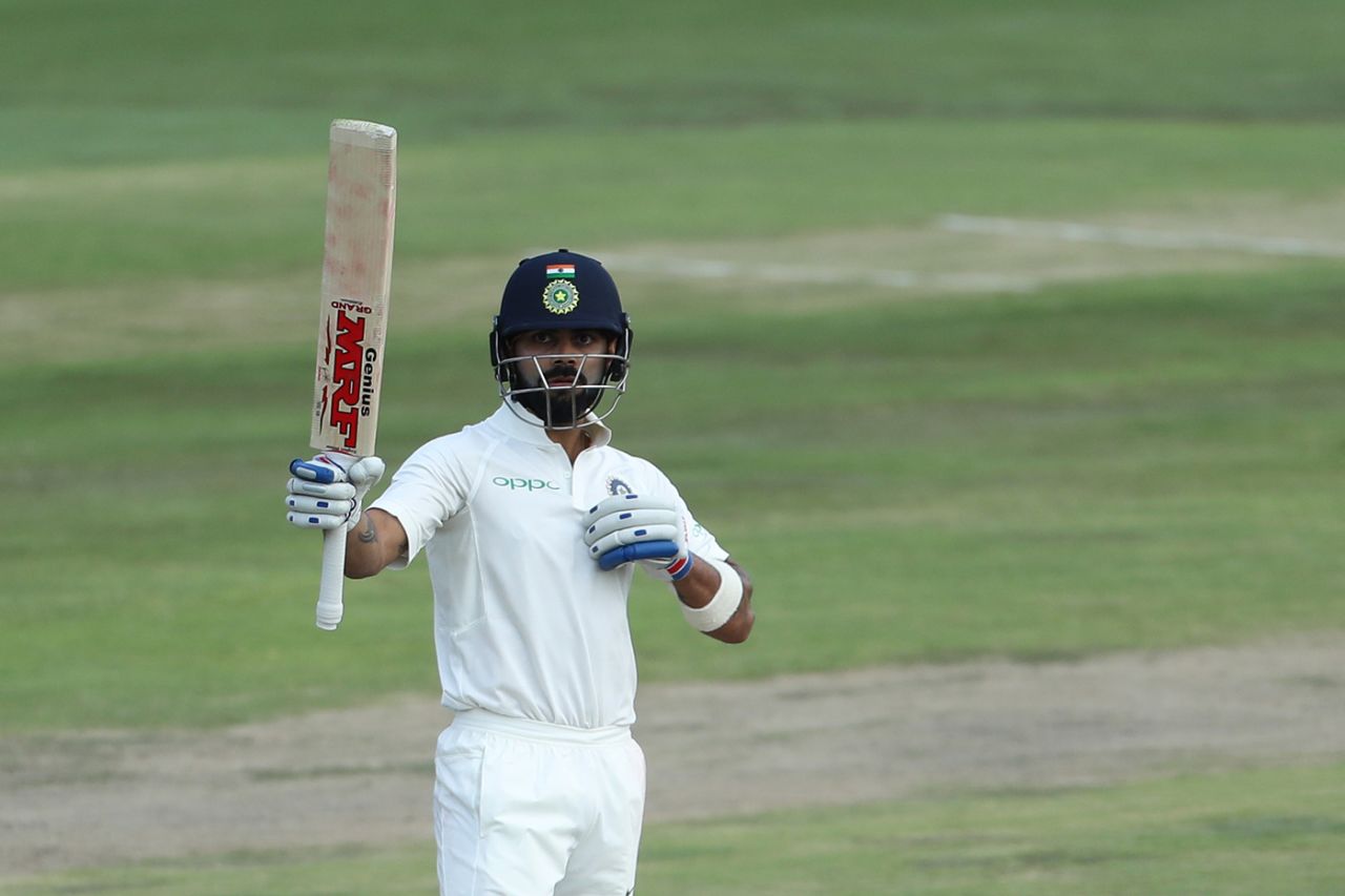 Virat Kohli raises his bat after getting to his half-century, South Africa v India, 2nd Test, Centurion, 2nd day, January 14, 2018