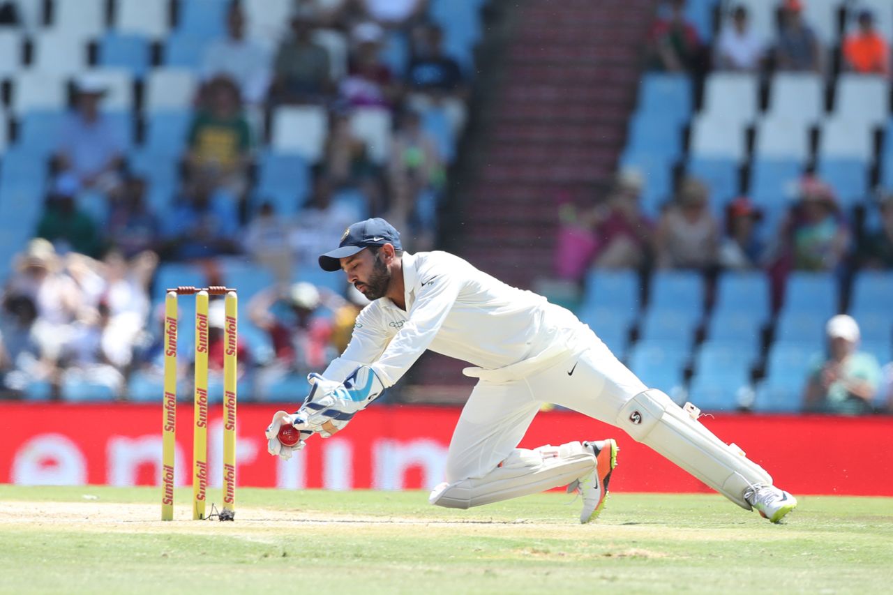 Parthiv Patel gathers a ball, South Africa v India, 2nd Test, Centurion, 2nd day, January 14, 2018