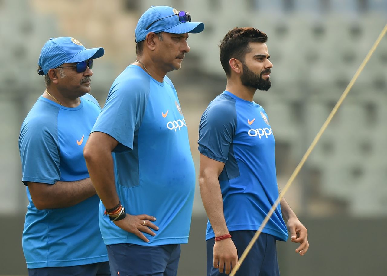 Virat Kohli with coach Ravi Shastri and bowling coach Bharat Arun, Mumbai, October 21, 2017