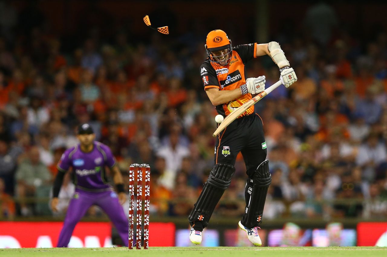 Micheal Klinger was bowled after a bouncer squeezed through to the stumps after hitting him on the helmet grille, Perth Scorchers v Hobart Hurricanes, Big Bash League, January 20, Perth