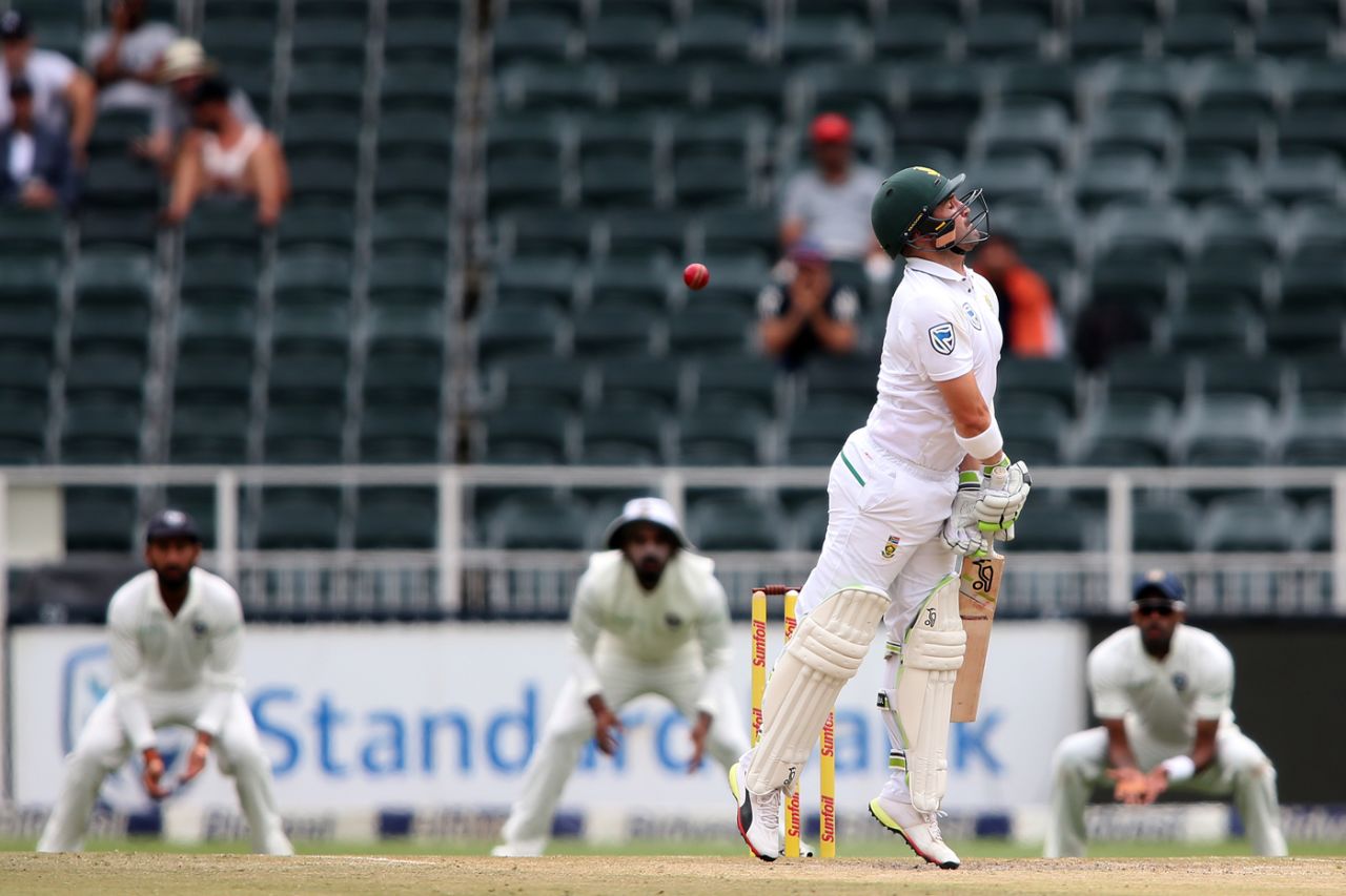 Dean Elgar tries to sway out of the line of a short ball, South Africa v India, 3rd Test, Johannesburg, 4th day, January 27, 2018
