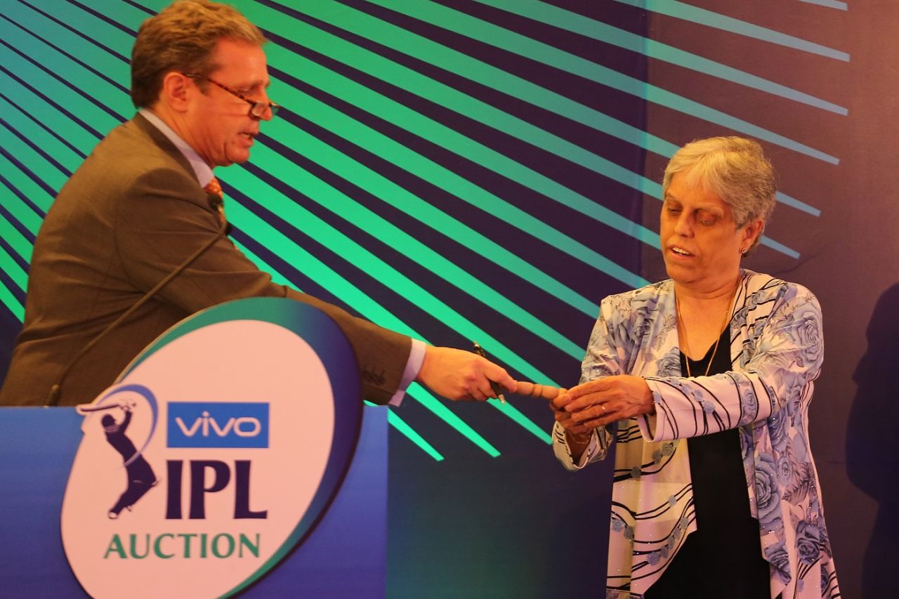 Diana Edulji picks the player bails at the IPL auction, Bengaluru, January 28, 2018