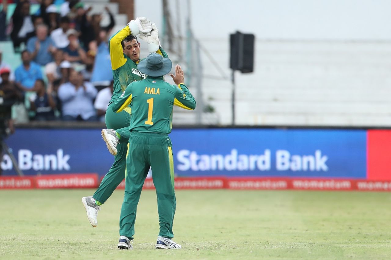Quinton de Kock is midway through clicking his heels in celebration, South Africa v India, 1st ODI, Durban, February 1, 2018