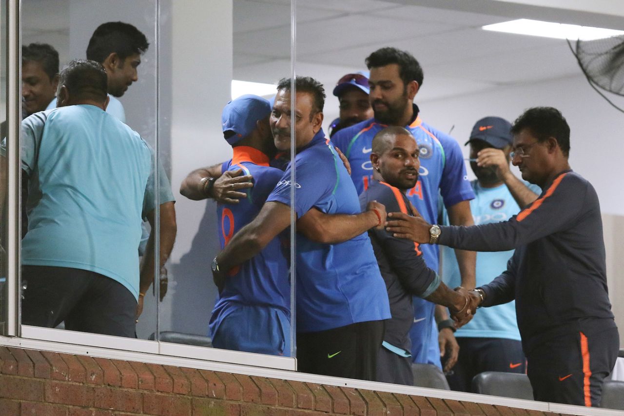 Virat Kohli and Ravi Shastri embrace in the dressing room, South Africa v India, 1st ODI, Durban, February 1, 2018
