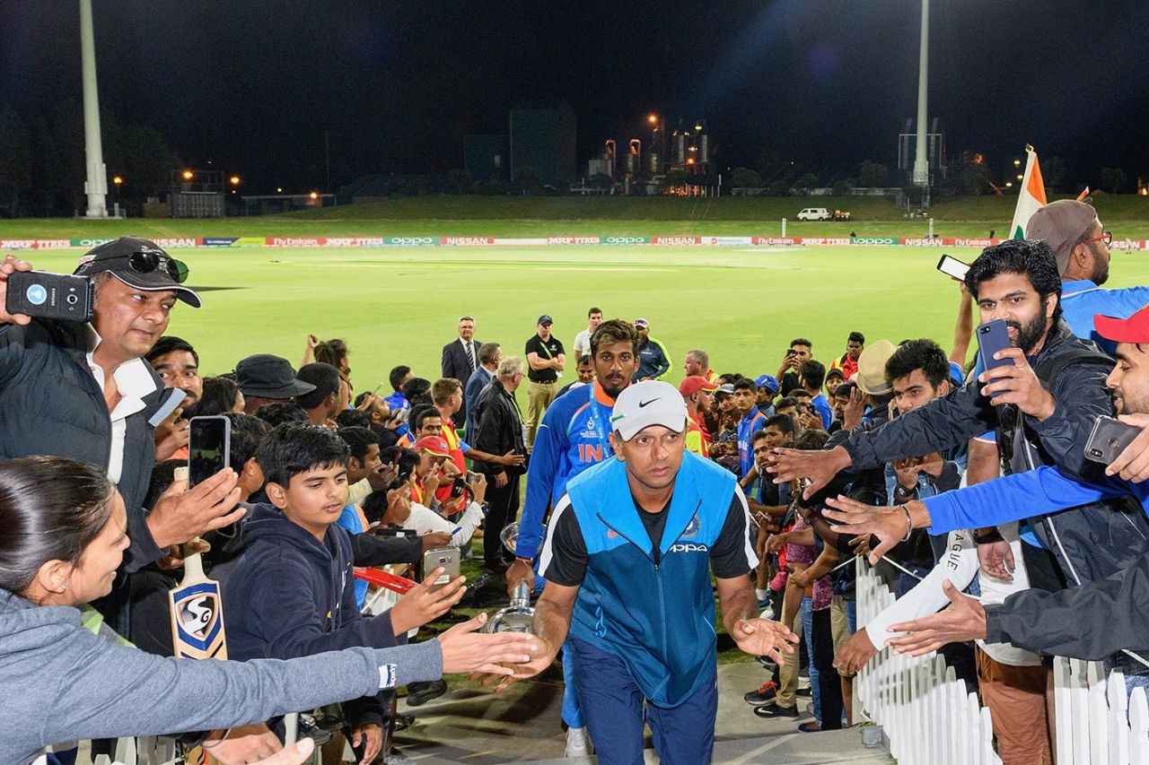 Rahul Dravid acknowledges the congratulations of fans as he walks off the field after India's win, Australia v India, Under-19 World Cup final, Mount Maunganui, February 3, 2018