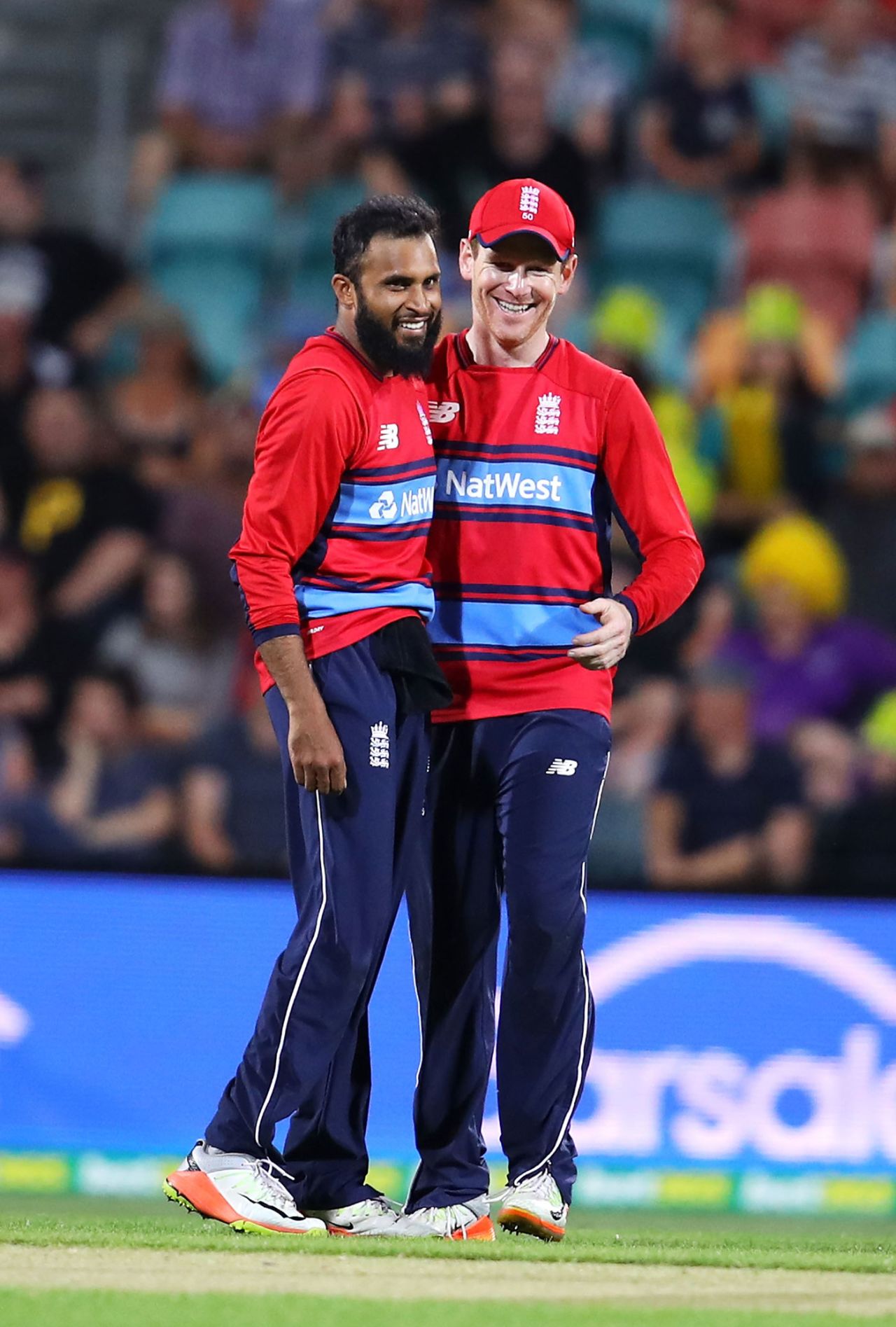 Adil Rashid gets a pat on the back from his captain, Australia v England, 2nd match, T20 Tri-Series, Hobart, February 7, 2018