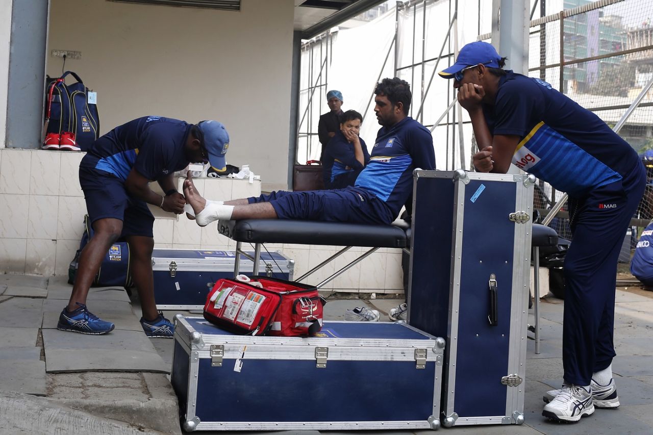 Dhananjaya de Silva is attended to by the physio, Mirpur, February 7, 2018