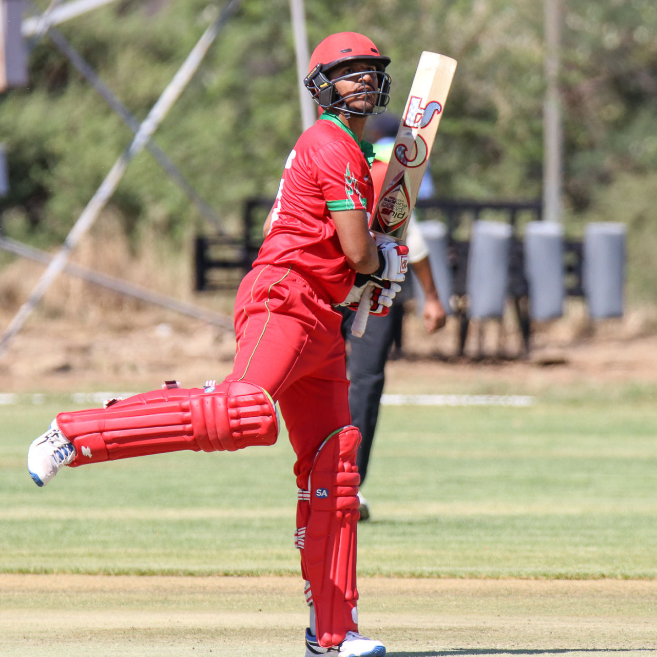 Aqib Ilyas completes a pirouette after hooking for six, Canada v Oman, ICC World Cricket League Division Two, Windhoek, February 8, 2018