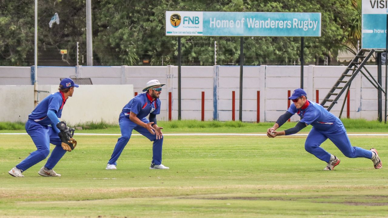Stephan Baard moves right to take a sharp low catch at gully for another Sarel Burger wicket, Namibia v Oman, ICC World Cricket League Division Two, Windhoek, February 11, 2018