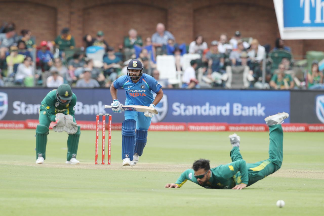 Rohit Sharma sets off for a run as JP Duminy fails to stop a ball off his own bowling, South Africa v India, 5th ODI, Port Elizabeth, February 13, 2018