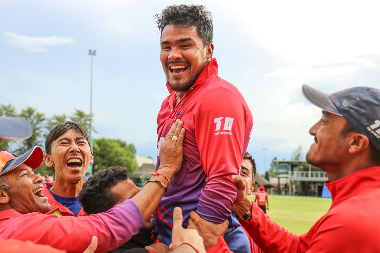 Karan KC is hoisted into the air by his team-mates after rallying Nepal to a miracle win, Canada v Nepal, ICC World Cricket League Division Two, Windhoek, February 14, 2018