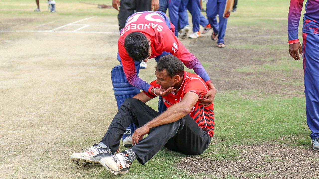 Sandeep Lamichhane consoles Canada medium pacer Cecil Pervez after the final ball, Canada v Nepal, ICC World Cricket League Division Two, Windhoek, February 14, 2018