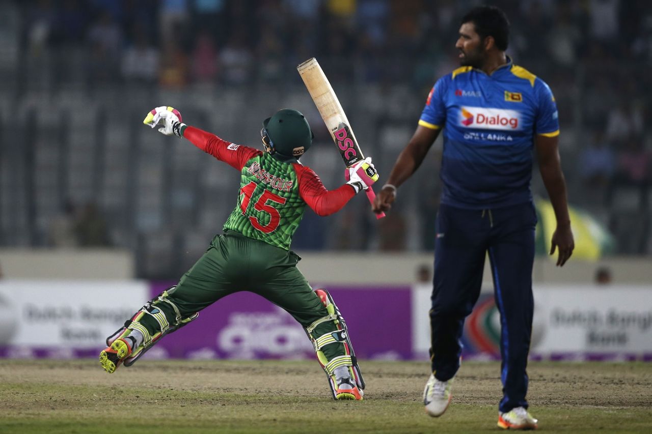 Thisara Perera looks an as Mushfiqur Rahim celebrates his second T20I fifty, Bangladesh v Sri Lanka, 1st T20I, Mirpur, February 15, 2018
