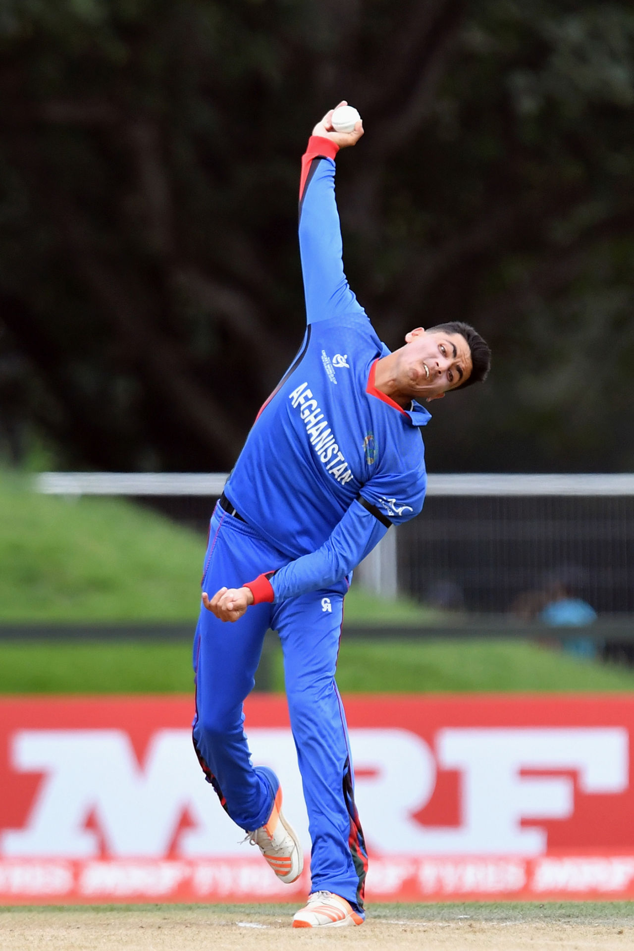 Mujeeb Ur Rahman in his delivery stride, New Zealand v Afghanistan, Under-19 World Cup, quarter-final, Christchurch, January 25, 2018