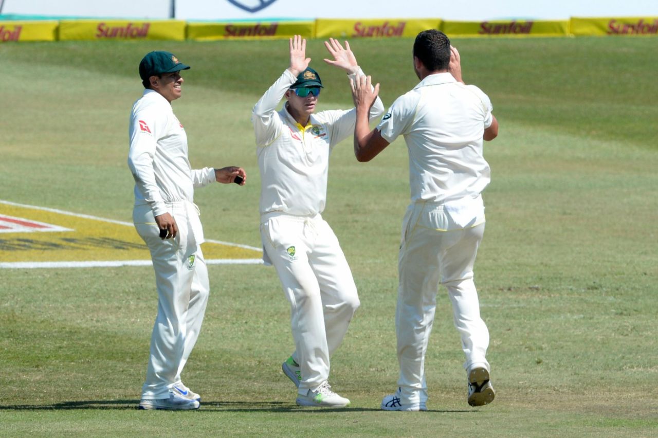 Josh Hazlewood, Steven Smith and Usman Khawaja celebrate, South Africa v Australia, 1st Test, Durban, 4th day, March 4, 2018
