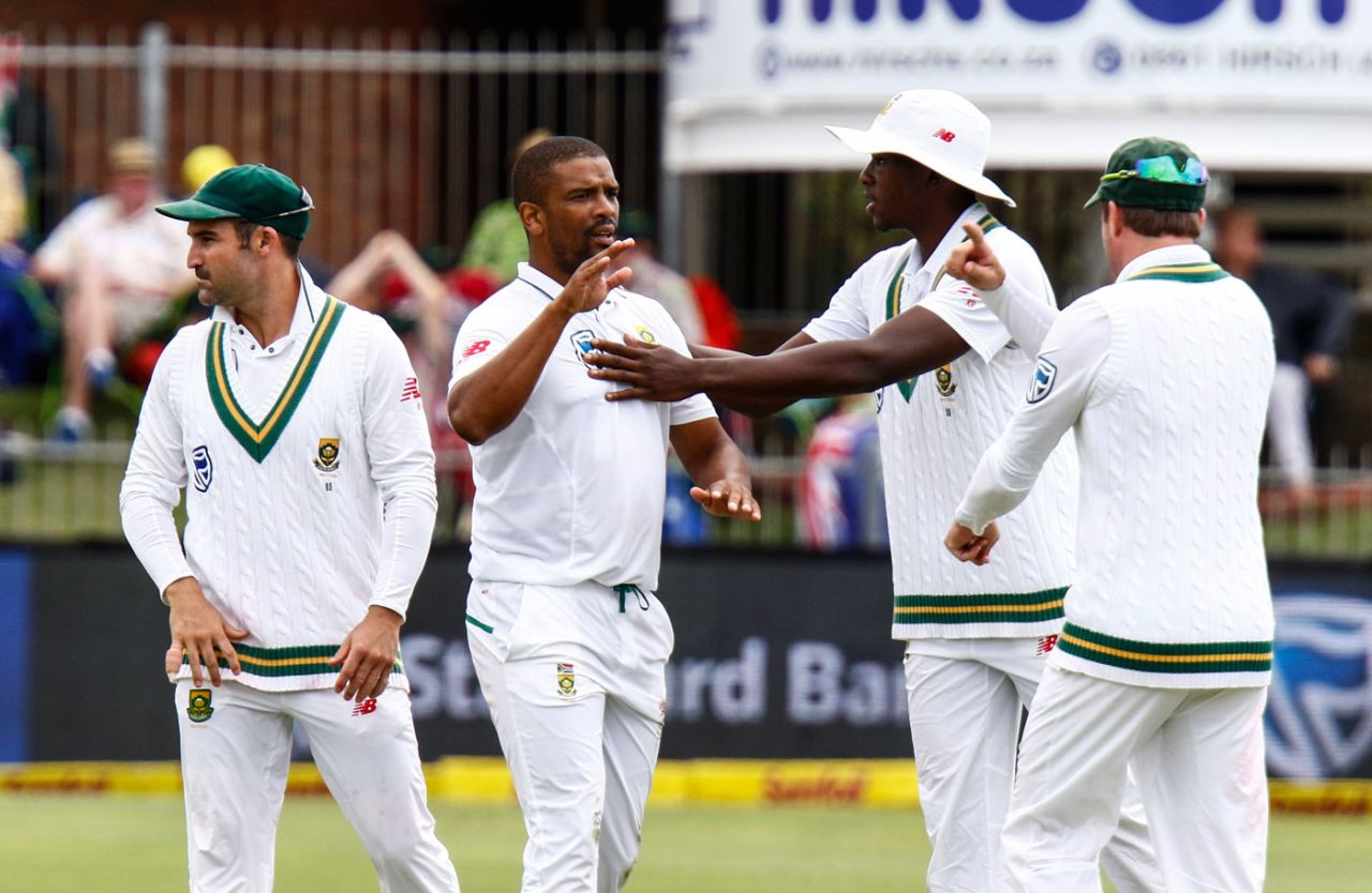 Vernon Philander is flanked by his team-mates after getting a wicket, South Africa v Australia, 2nd Test, 1st day, Port Elizabeth, March 9, 2018