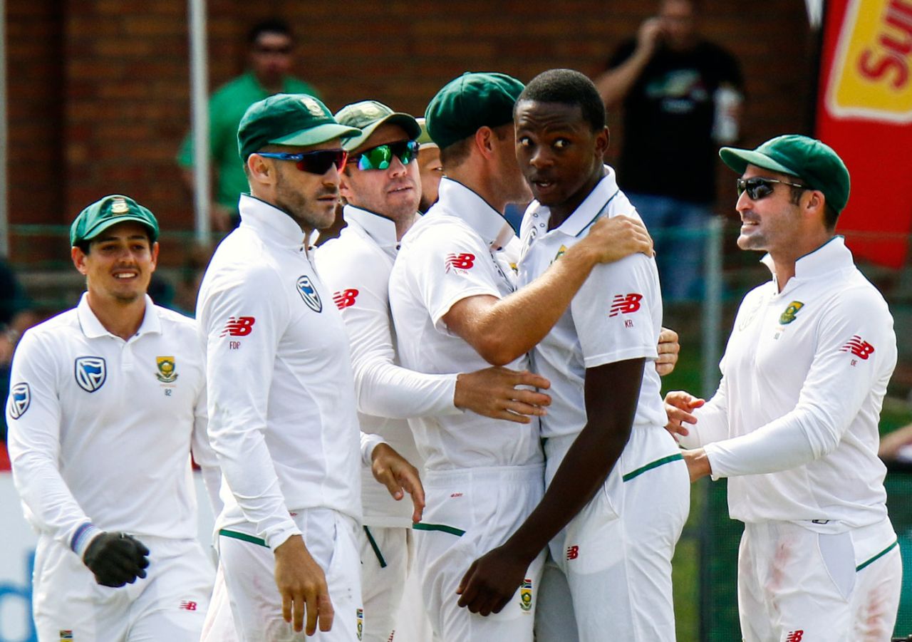 Kagiso Rabada celebrates a wicket with his team-mates, South Africa v Australia, 2nd Test, 1st day, Port Elizabeth, March 9, 2018
