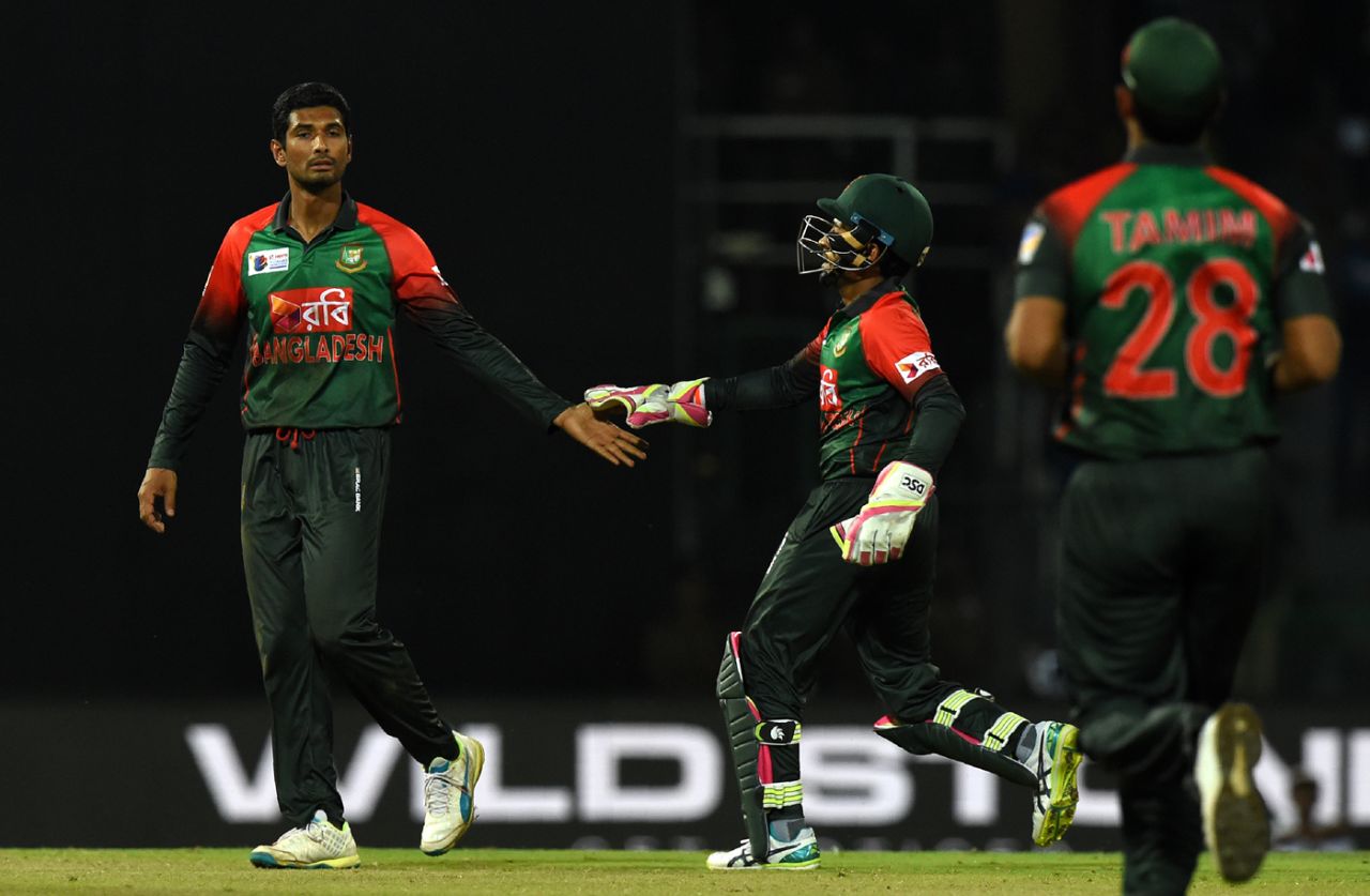 Mahmudullah is congratulated by Mushfiqur Rahim upon picking up a wicket, Bangladesh v Sri Lanka, Nidahas T20I Tri-series, Colombo, March 10, 2018