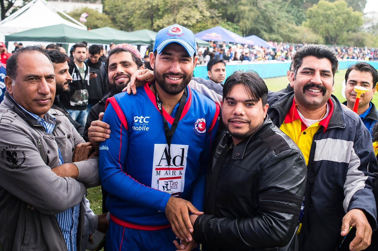 Babar Hayat poses with fans for photos while playing for Kowloon Cantons in a Hong Kong Blitz match, March 11, 2017