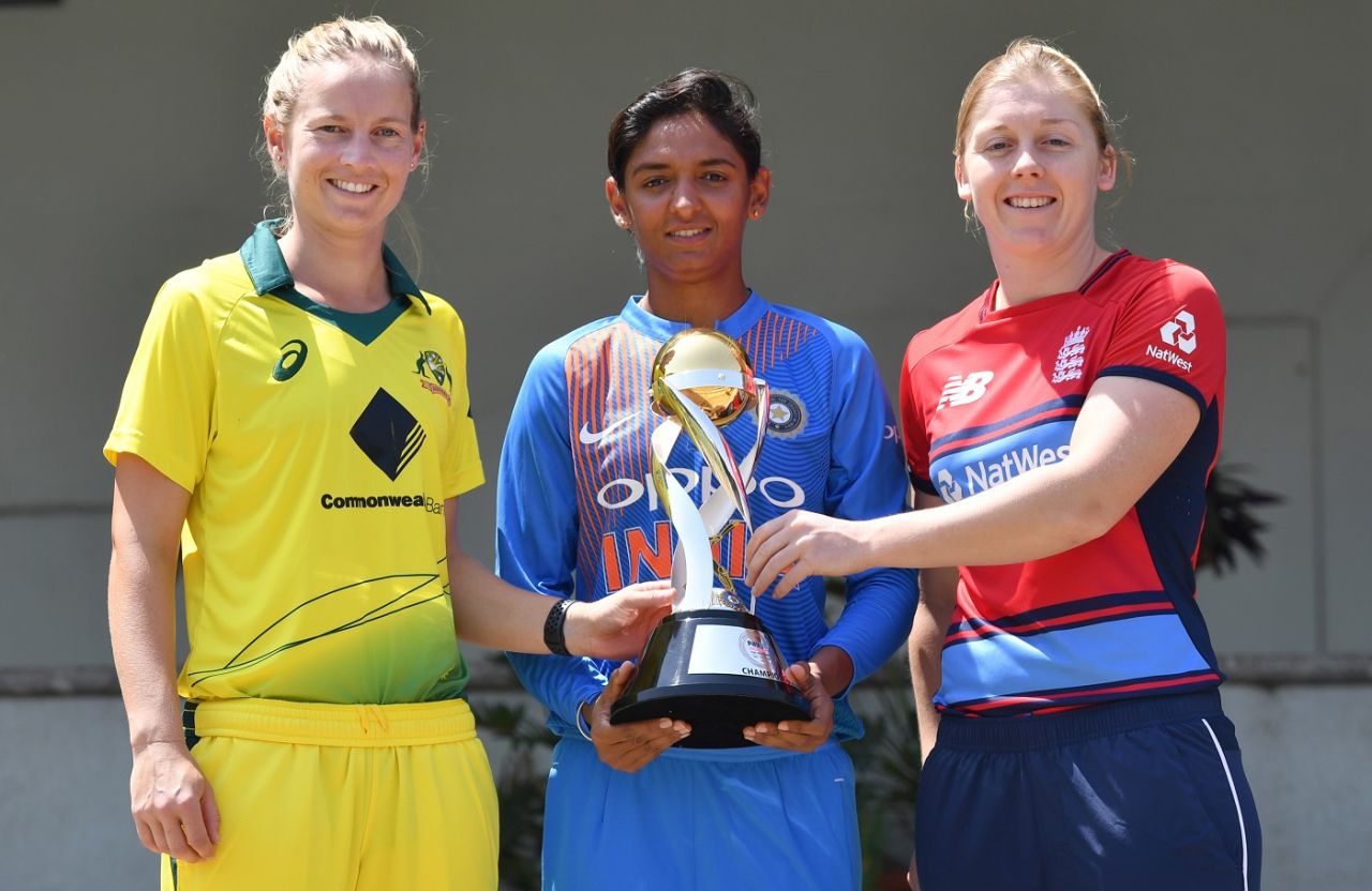 Team captains Meg Lanning, Harmanpreet Kaur and Heather Knight pose with the tri-series trophy, Mumbai, March 21, 2018