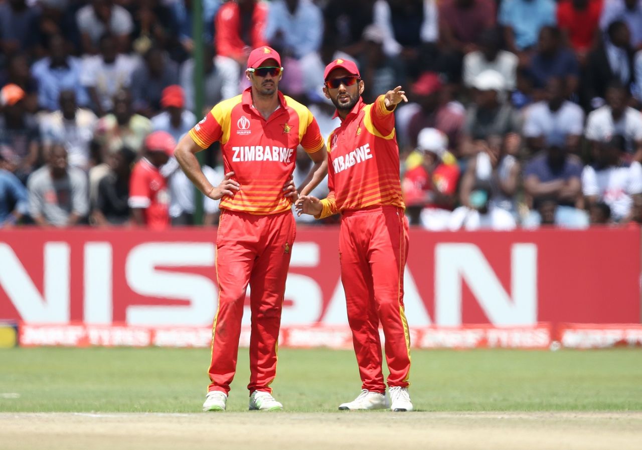 Graeme Cremer and Sikandar Raza discuss in the middle, Zimbabwe v UAE, World Cup qualifier, Super Sixes, Harare, March 22, 2018