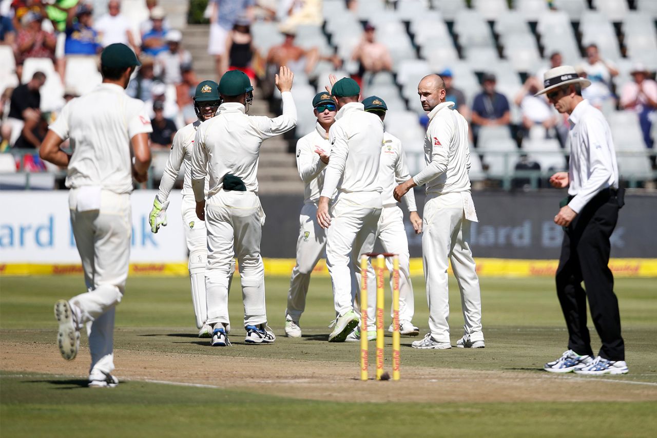 Nathan Lyon celebrates a wicket with his team-mates, South Africa v Australia, 3rd Test, Cape Town, 2nd day, March 23, 2018