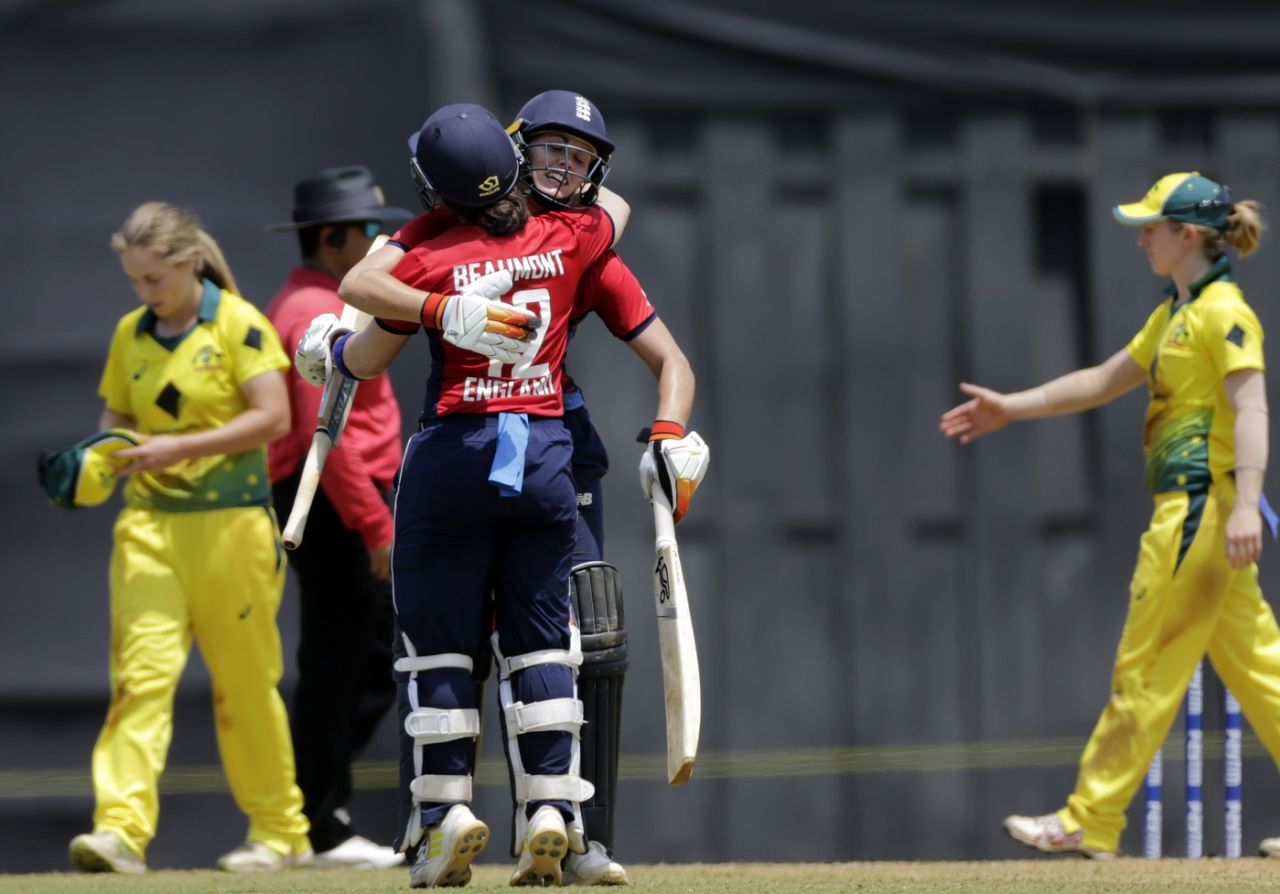 Natalie Sciver and Tammy Beaumont celebrate after powering England to victory, Australia v England, Tri-Nation Women's T20 series, Mumbai, March 23, 2018
