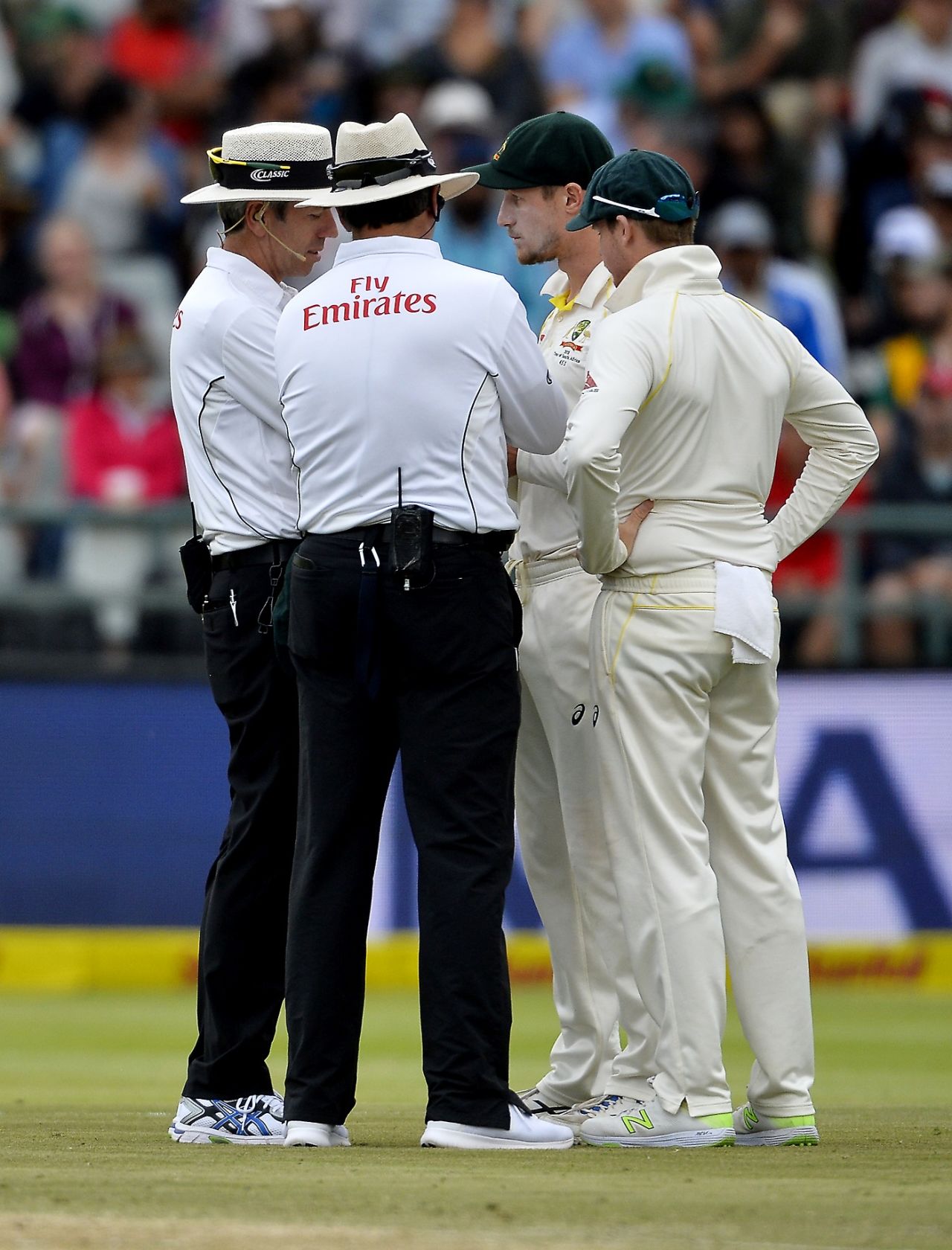 Steven Smith joined the conversation as umpires spoke to Cameron Bancroft, South Africa v Australia, 3rd Test, Cape Town, 3rd day, March 24, 2018