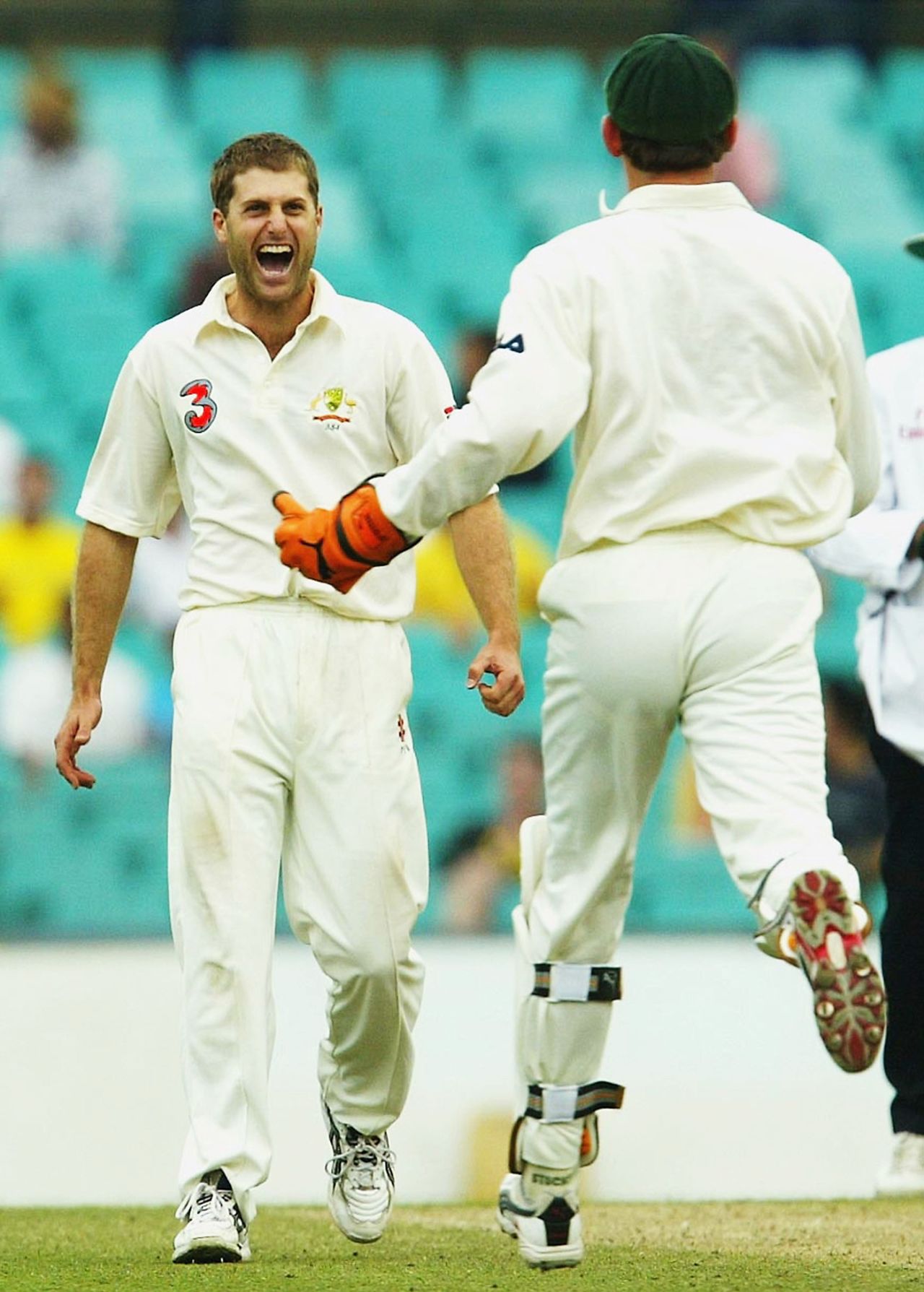 Simon Katich celebrates after taking the wicket of Stuart Carlisle, Australia v Zimbabwe, 2nd Test, Sydney, 3rd day, October 19, 2003
