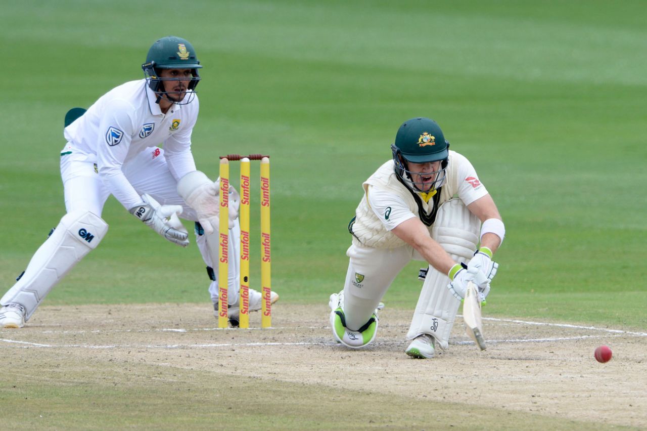 Tim Paine gets down for the paddle sweep, South Africa v Australia, 4th Test, 3rd day, Johannesburg, April 1, 2018