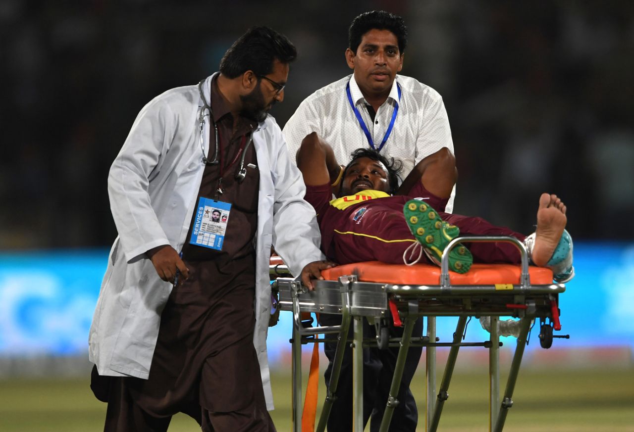 Veerasammy Permaul gestures as he lies on a stretcher after being injured, Pakistan v West Indies, 1st T20I, Karachi, April 1, 2018