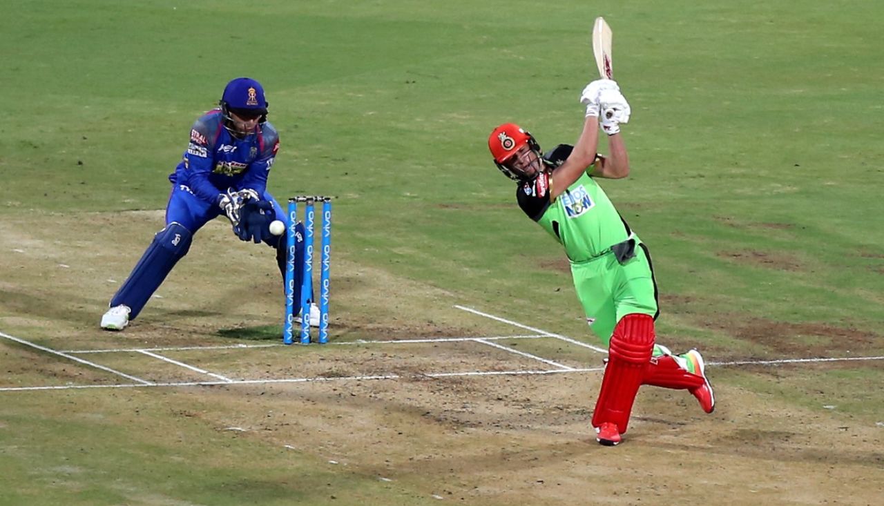 AB de Villiers misses a googly, Jos Buttler is about to miss a stumping, Royal Challengers Bangalore v Rajasthan Royals, IPL 2018, Bengaluru, April 15, 2018 