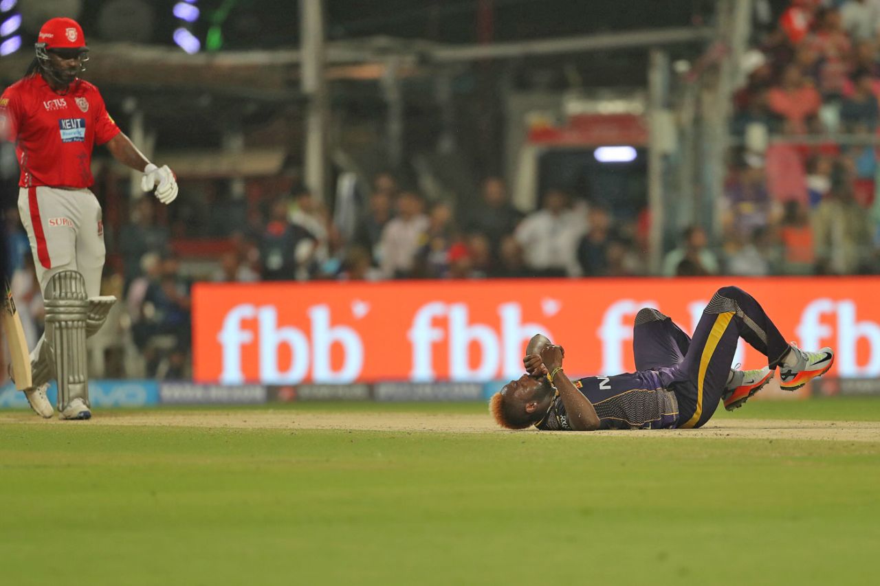 Andre Russell falls to the floor in pain, Kolkata Knight Riders v Kings XI Punjab, IPL 2018, Kolkata, April 21, 2018