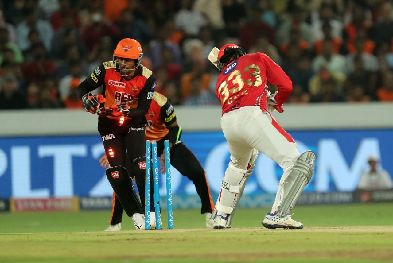 Chris Gayle slides his back leg inside the line as Wriddhiman Saha whips the bails off, Sunrisers Hyderabad v Kings XI Punjab, IPL 2018, Hyderabad, April 26, 2018
