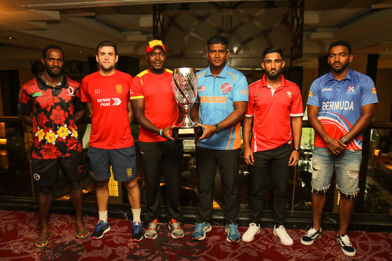 The six captains pose with the WCL Division Four tournament trophy, Kuala Lumpur, April 28, 2018